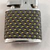 Vintage MAC TON automatic lighter with heavy netted rubber with yellow spots.