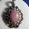 CAROLYN POLLACK RELIOS RHODONITE Pendant on Bronze Braided Leather Necklace.